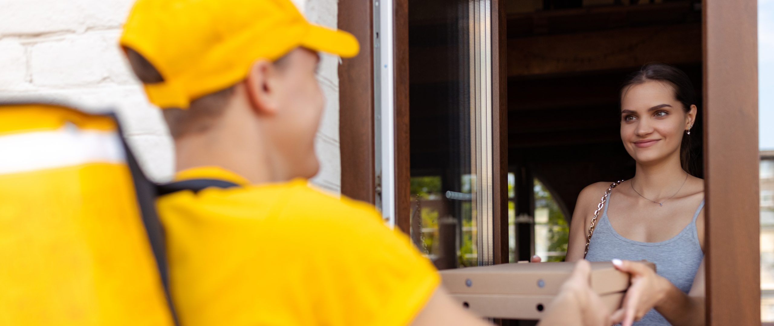 A restaurant delivery rider using a mobile app to streamline order tracking and ensure timely deliveries.